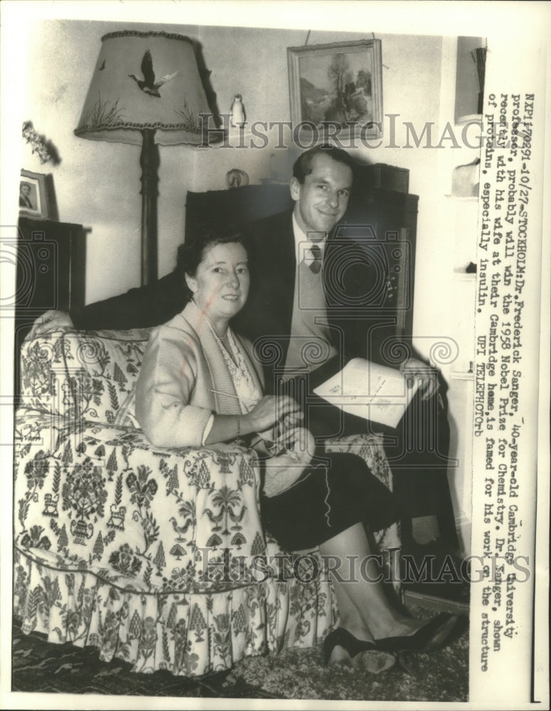 1958 Press Photo Dr. Frederick Sanger, with his wife in Stockholm - mjc17275 - Historic Images
