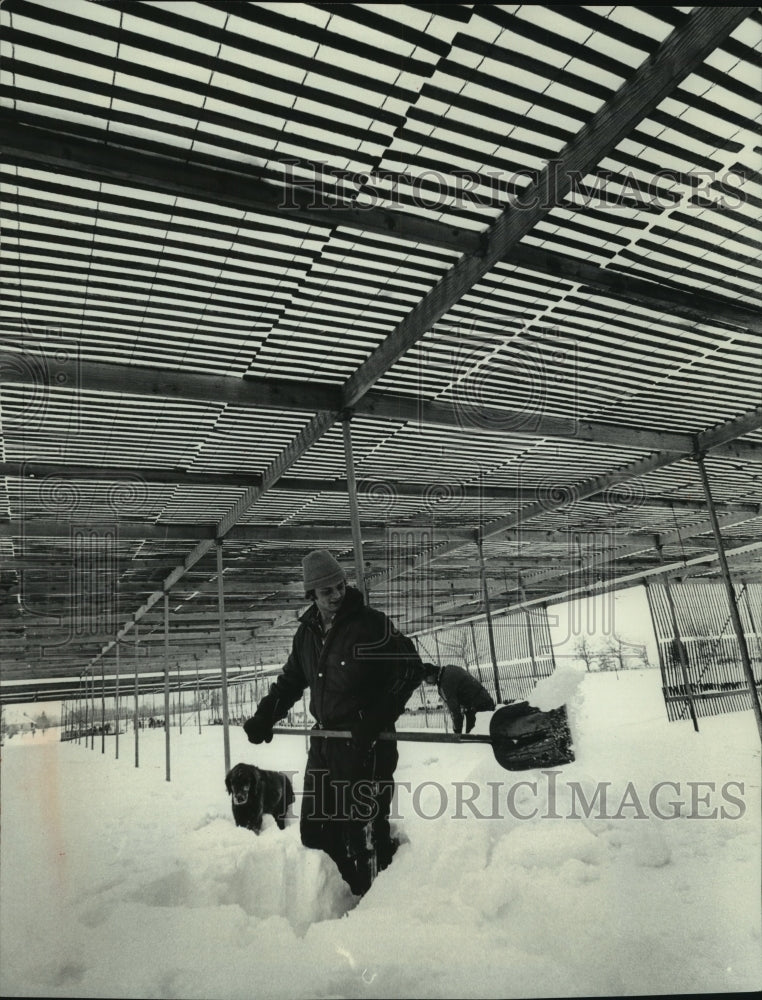 1979, Jeff Wolters and Chuck Kelly clears snow Menomonee Falls, WI - Historic Images