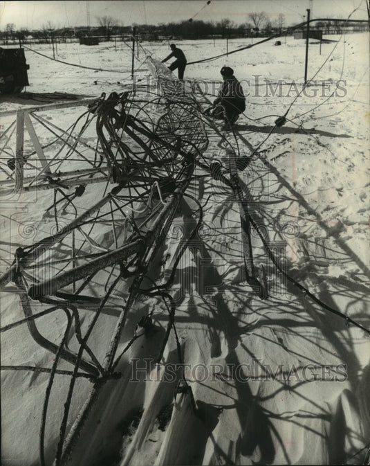 1964 Press Photo Workmen removed tangled guy wires from downed WEMP radio tower. - Historic Images