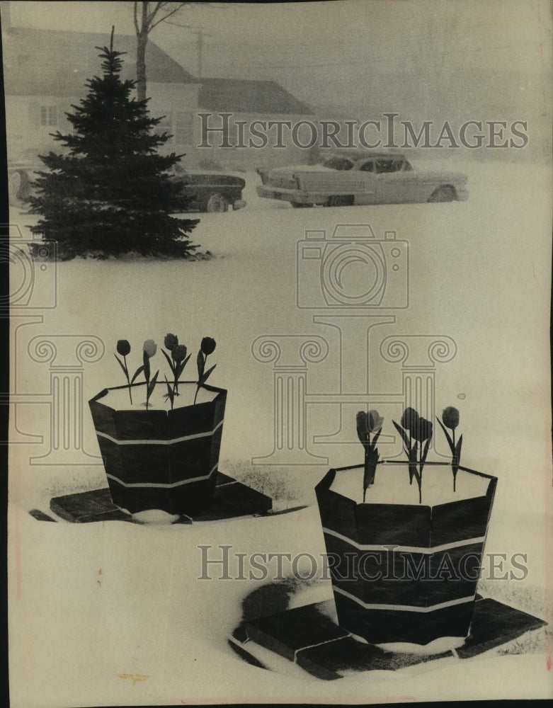 1961 Press Photo Artificial tulips stand in snow filled planters in Milwaukee. - Historic Images