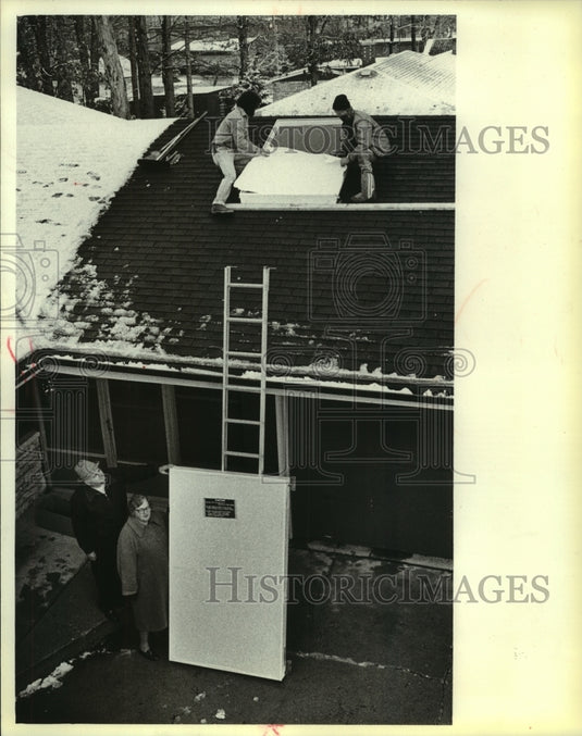 1979 Gordon Turner and his sister Sally with solar heating panel - Historic Images