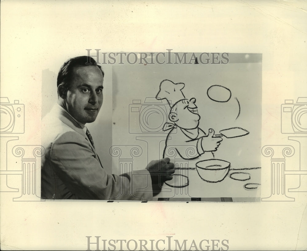 1988 Sid Stone drawing a caricature of a chef - Historic Images