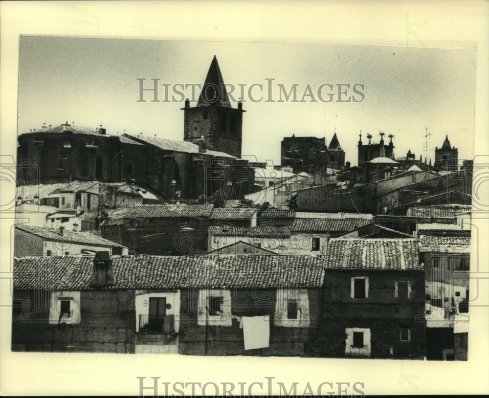 1984, Tiled rooftops in town of Caceres, Spain, home to storks. - Historic Images