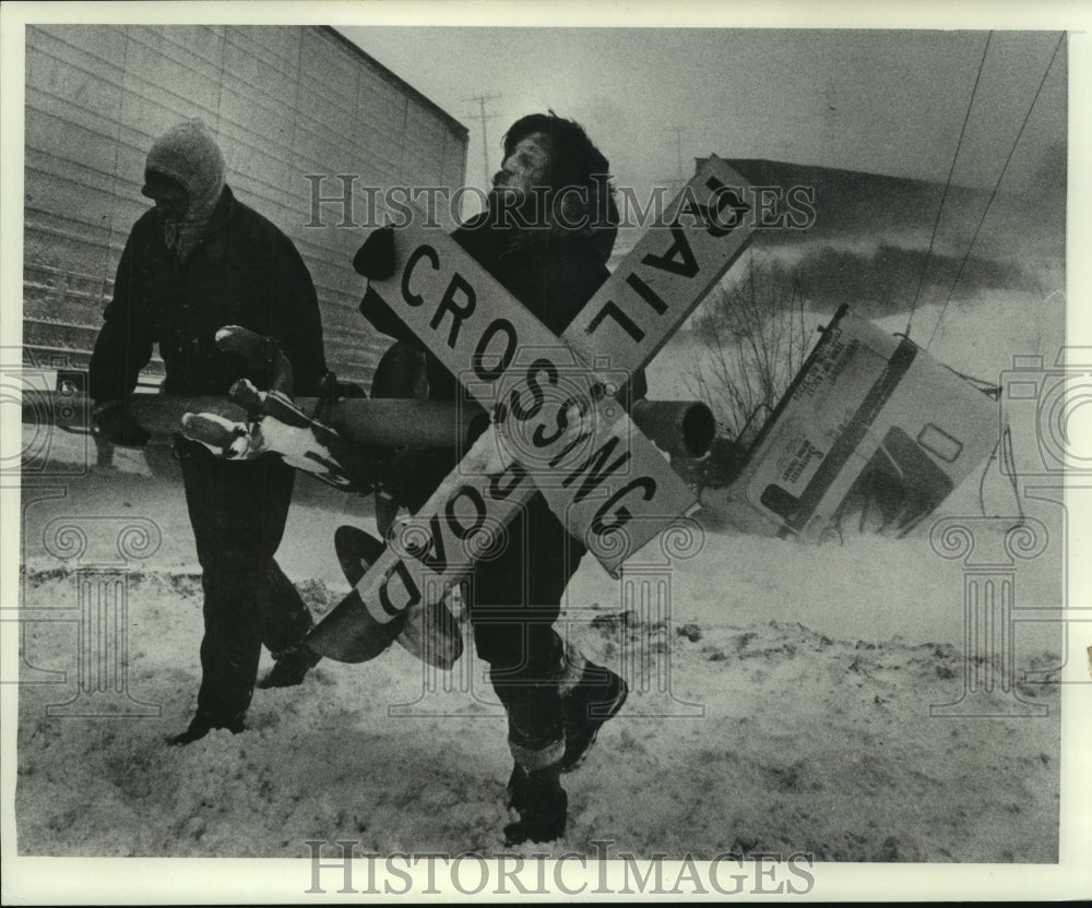 1978, Workers cleared debris from truck accident with train Milwaukee - Historic Images