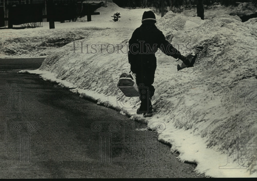 1979, Robert Mathaus walking home from St.Agnes School in Butler - Historic Images