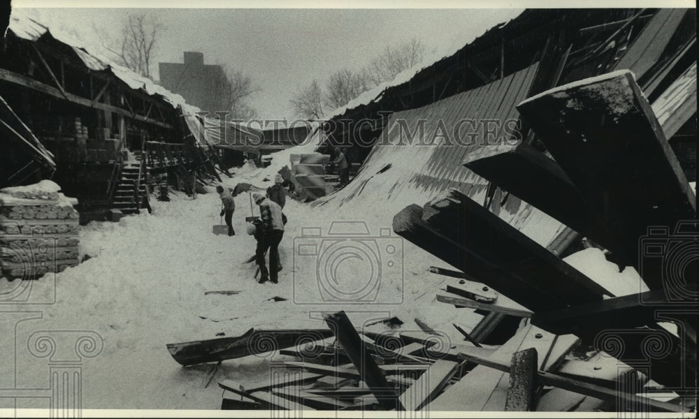 1979 Snow on metal roof collapsed at Palmetier &amp; Abell Lumber Co - Historic Images