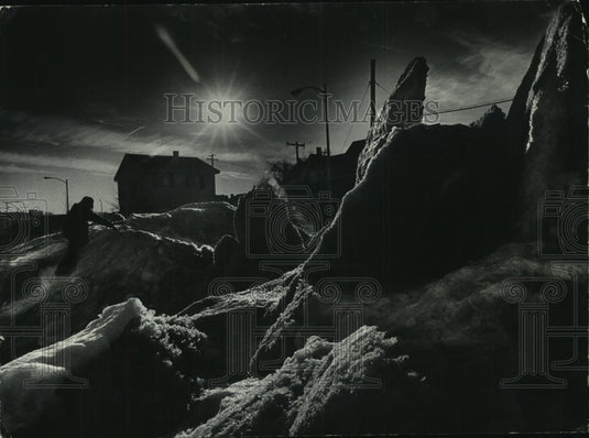 1979, Youth climbs over peaks of ice and snow, Milwaukee - mjc18116 - Historic Images