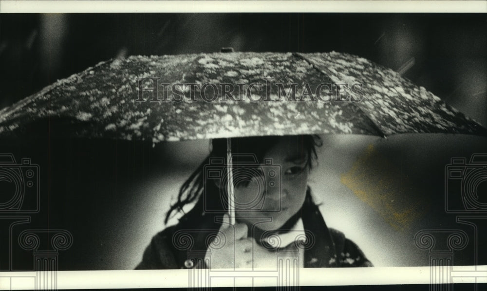 1990, Hanako Ikeno in a snow storm going to Hartford Avenue School - Historic Images