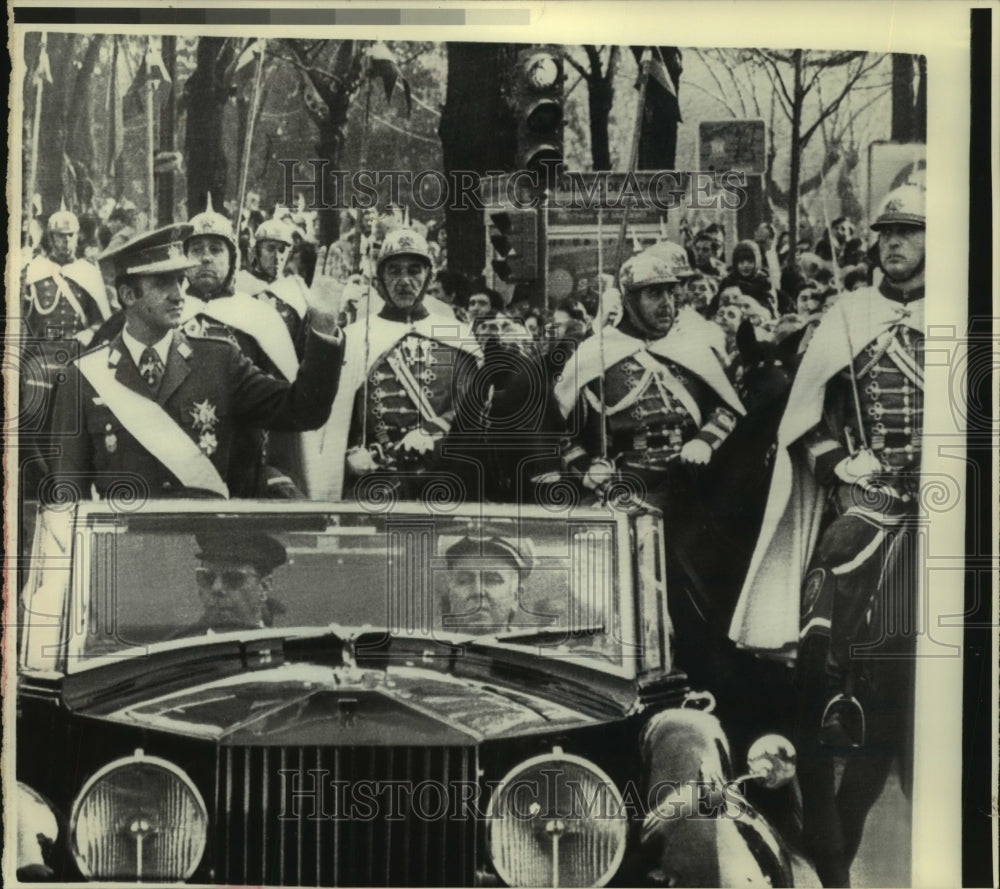 1975, King Juan Carlos of Spain waves to the crowd in Madrid - Historic Images