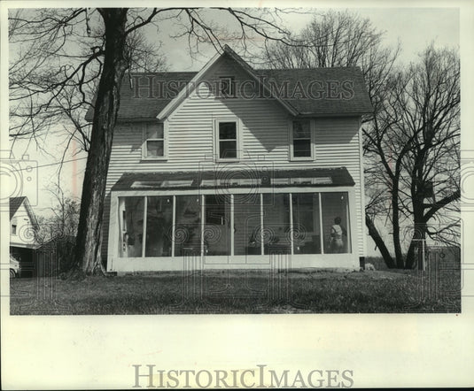 1979 Porch of an old farmhouse turned into a greenhouse - Historic Images