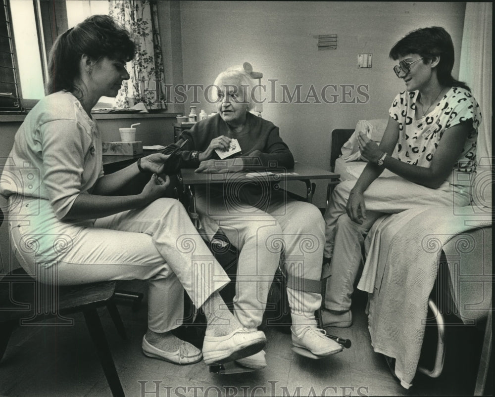 1988, A Game of Gin Rummy at Trinity Memorial Hospital, Cudahy - Historic Images