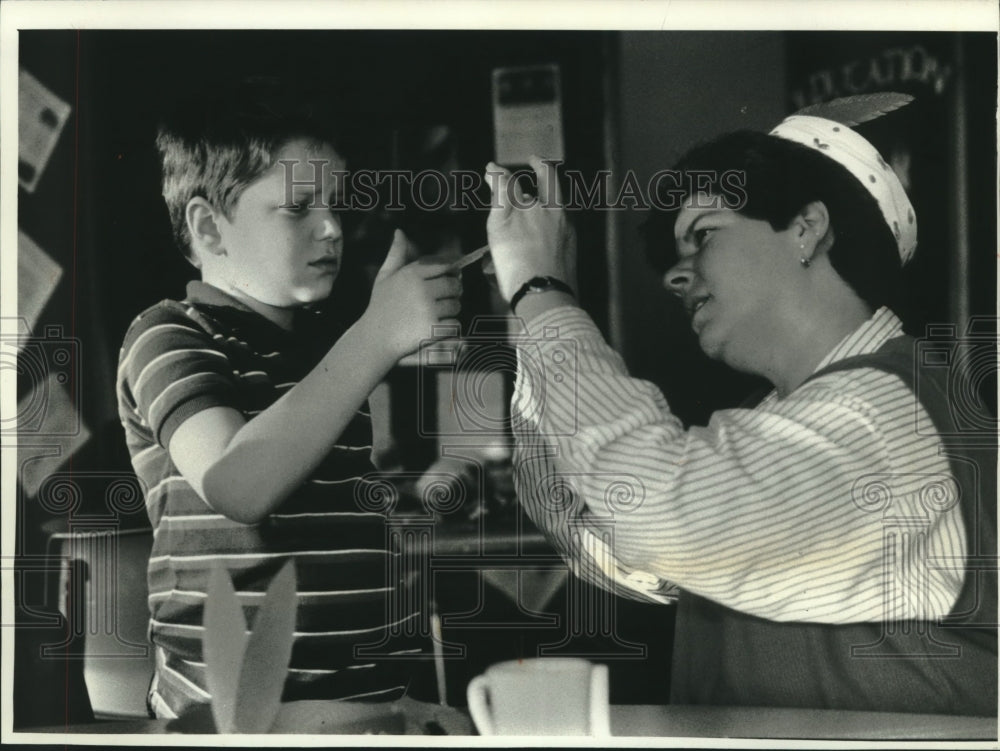 1992 Mother &amp; son duo make turkey napkin holders for thanksgiving - Historic Images