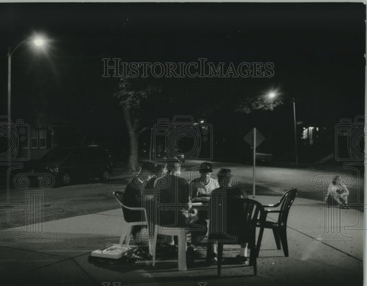 1993, A group of Bay View students play Scrabble on a traffic island - Historic Images