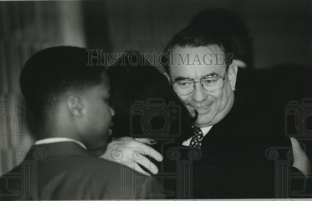 1994, Tommy Thompson Hugs Lady During Campaign - mjc19092 - Historic Images