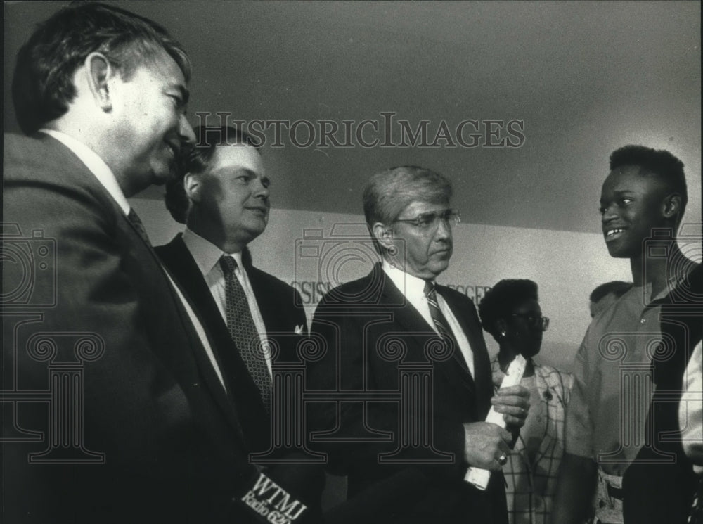 1990, Wisconsin Governor Tommy Thompson touring Greg Eggerson home - Historic Images