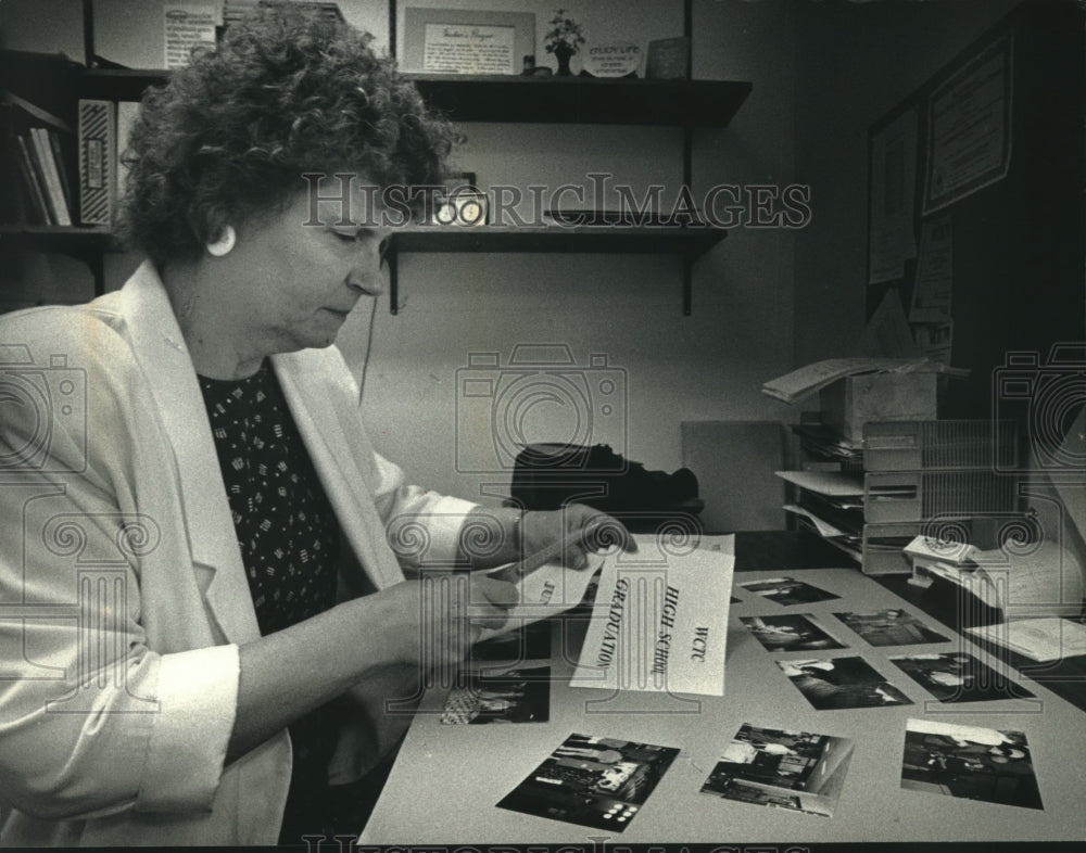 1992, Diane Valentine Works on Photo Collage of Waukesha Graduates - Historic Images