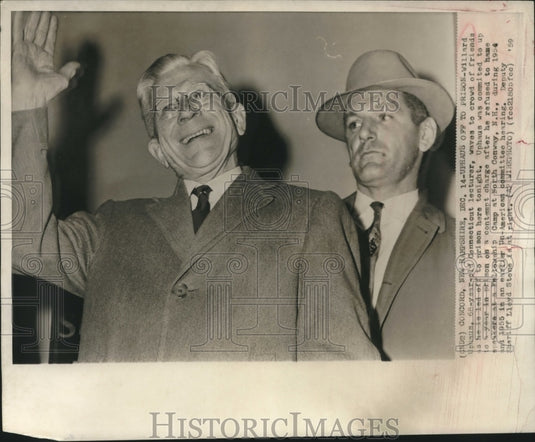 1959, Doctor Willard Uphaus Waves to Friends While Heading to Prison - Historic Images