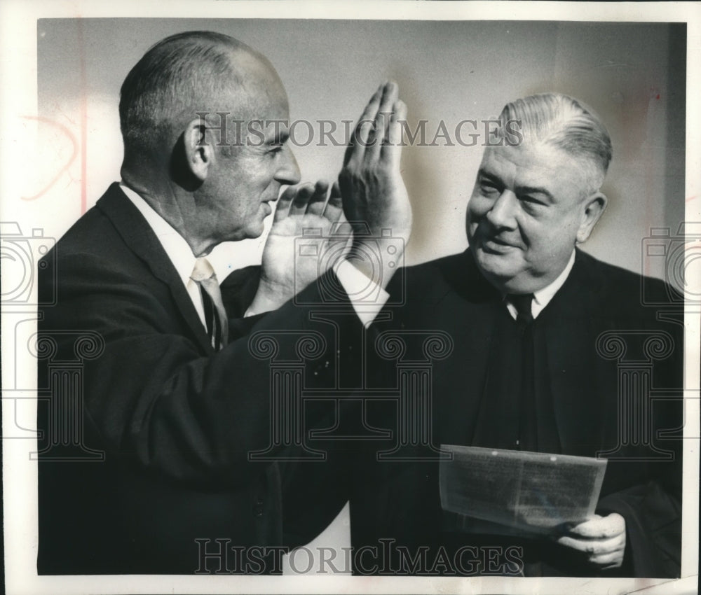 1961, James Dillon sworn in by Judge Robert E. Tehan in Wisconsin - Historic Images