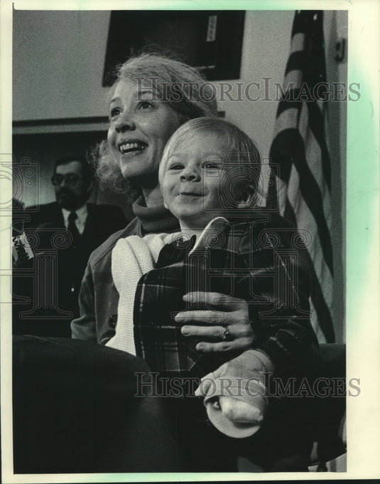 1985 Michael Troche with mother Judy leaving hospital in Milwaukee - Historic Images