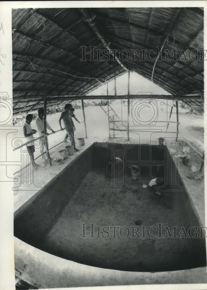 1976, Archaeologists search for relics under covered site in Thailand - Historic Images