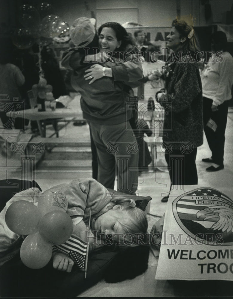 1991, Barbara Cowle and Chris Coulter Greet Patrick Cowle, Milwaukee - Historic Images