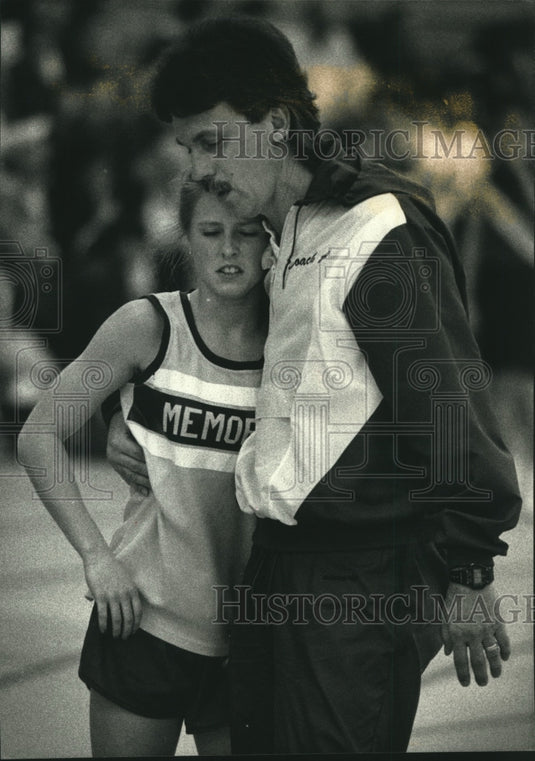1992 Man Hugs Catholic Memorial Track Runner After Relay in Waukesha - Historic Images