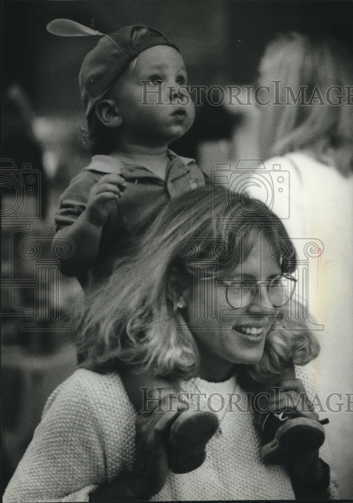 1993, Fraser Ferentz Sits on Mother Ellen&#39;s Shoulders at Third Ward - Historic Images
