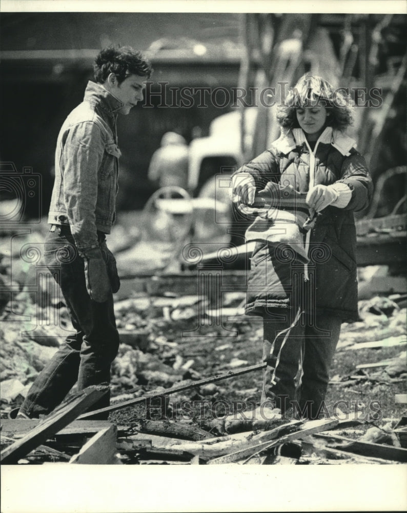 1984, Alex Kuhlow &amp; Chris Hines search the rubble, Wisconsin - Historic Images