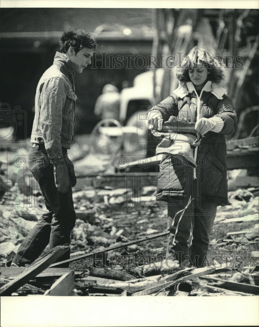 1984, Alex Kuhlow & Chris Hines search the rubble, Wisconsin - Historic Images
