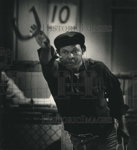 1989, Ray Hicks shoots a horse shoe - mjc19887 - Historic Images