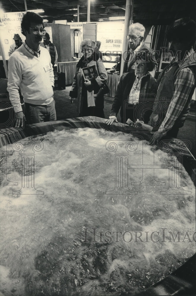 1984, Home Improvement Show Visitors Watch a Hot Tub Demonstration - Historic Images