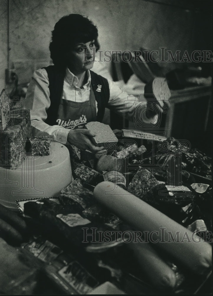 1990, Jill Lambert heads counter sales at Usinger&#39;s shop - mjc19964 - Historic Images