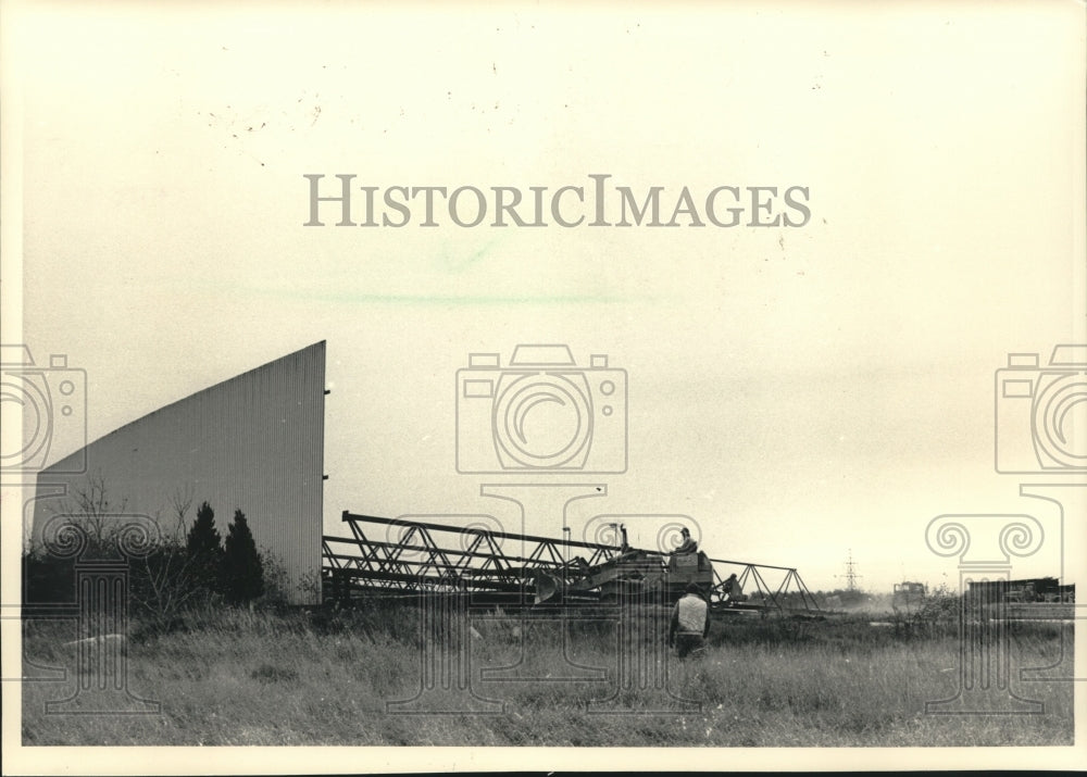 1986 Press Photo Bulldozer Topples Theater Construction in Wisconsin - mjc20104 - Historic Images