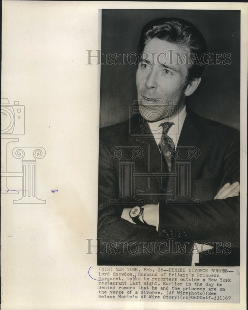 1967, Lord Snowdon talks to reporters outside a New York restaurant - Historic Images