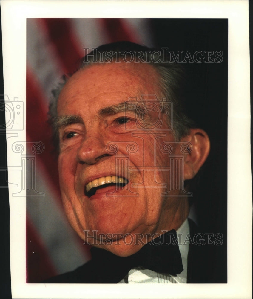 1994 Richard Nixon smiling in tuxedo - Historic Images