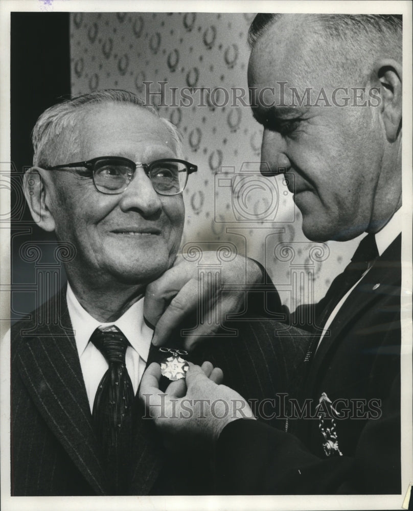 1958, Max Karger receives membership pin from Vernon McMillen - Historic Images