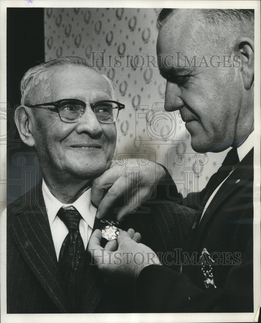 1958, Max Karger receives membership pin from Vernon McMillen - Historic Images