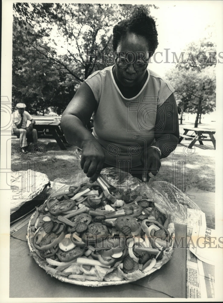 1988 Mattie Lawrence arranging a salad plate, Wisconsin - Historic Images