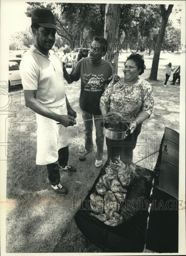 1988 Grilling at Seniors in Community Service picnic in Lincoln Park - Historic Images