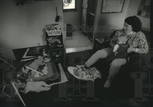 1993, Debbie Seibel in the nursery with her quintuplets, Wisconsin - Historic Images