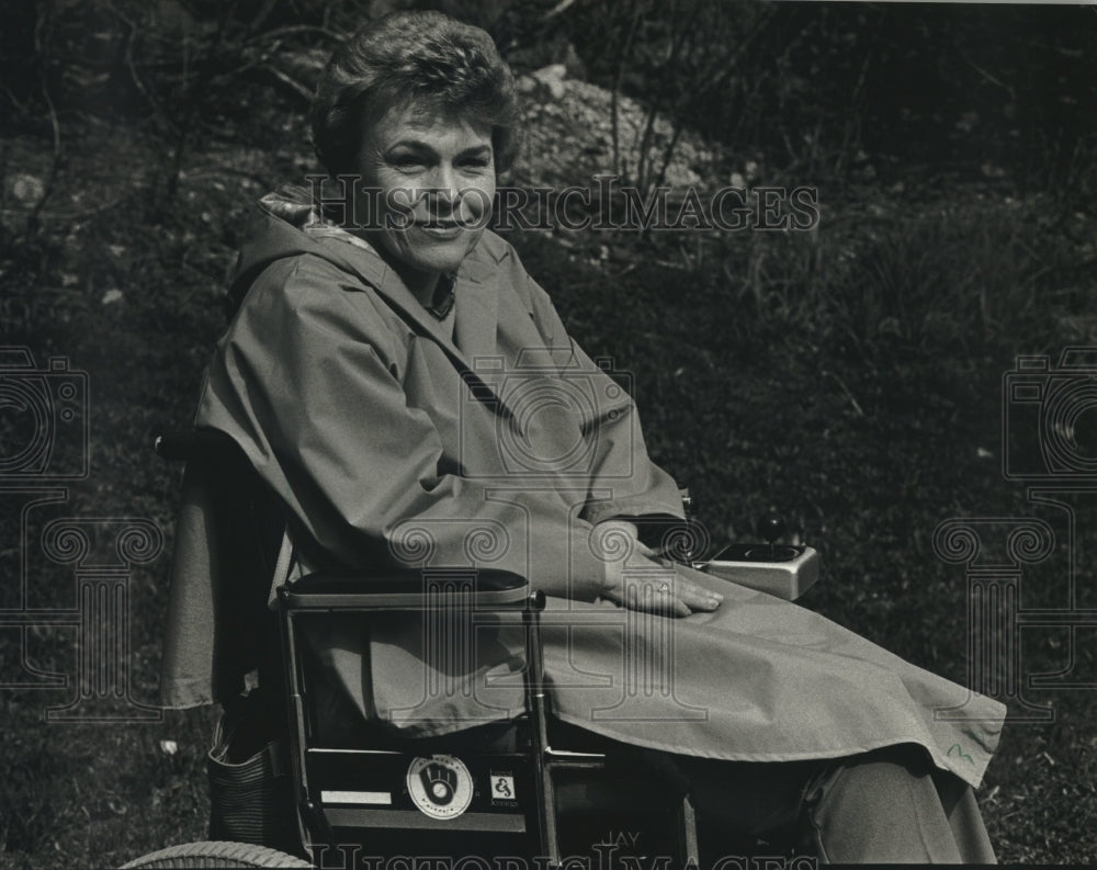1993 Julia Miller &amp; her raincoat for wheelchair use, Wauwatosa - Historic Images