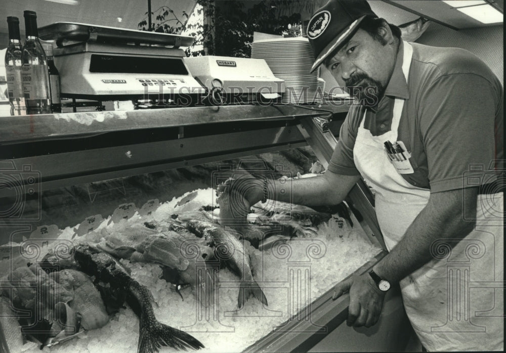 1989 Marvin Dufek holds fish Sendik&#39;s Bay Fish Market, Whitefish Bay - Historic Images