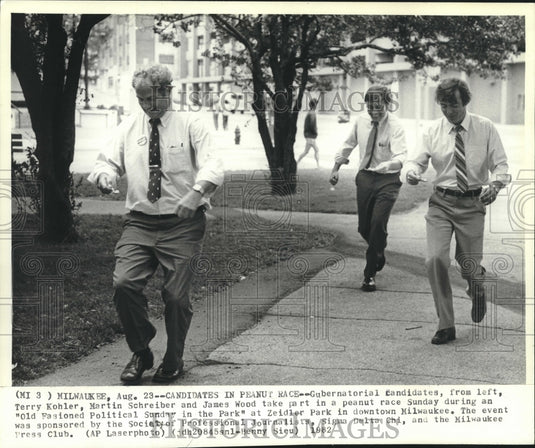 1982 Press Photo Wisconsin Governor Candidates in Peanut Race at Event in Park - Historic Images