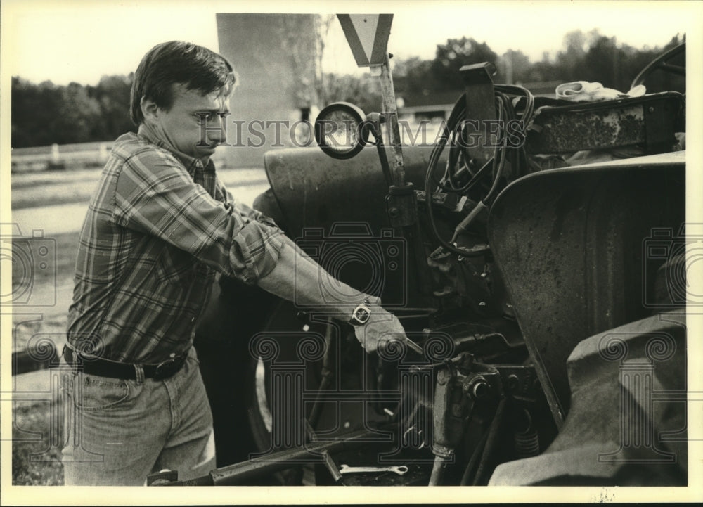 1979, Former Governor Martin Schreiber on his farm, Stevens Point - Historic Images