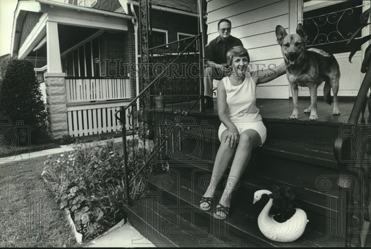 1982 Tough Times Series - Jerry & Shirley Widmer at home with dog - Historic Images