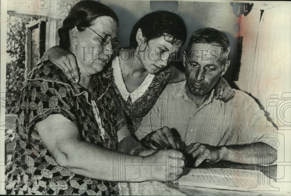 1981, Soviet spaceman, Gherman Titov, family members writing letter - Historic Images