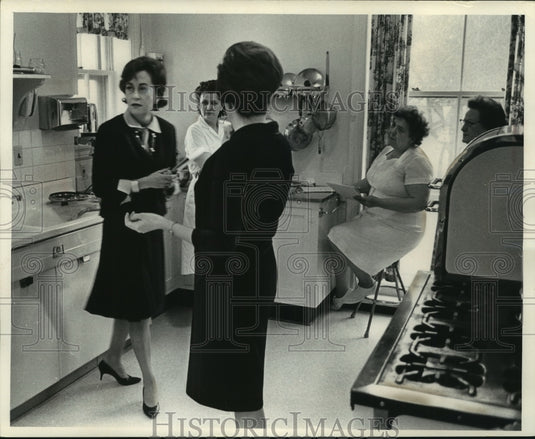 1964, Staff Listens To Mrs. Warren Knowles In Governor's Kitchen - Historic Images