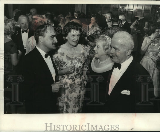 1960, Francis Trecker and wife entertain at their Pine Lake Home - Historic Images