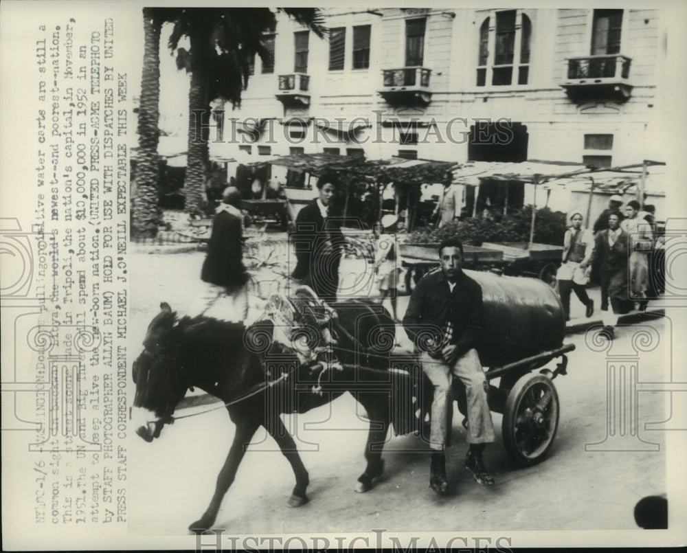 1952 Press Photo Donkeys pulling water carts Tripoli, Libya - mjc21969 - Historic Images