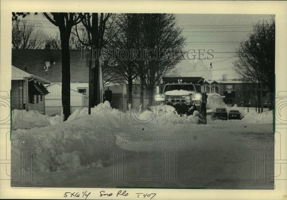 1985, Snow plow clearing West Melvina Street in Milwaukee, Wisconsin - Historic Images